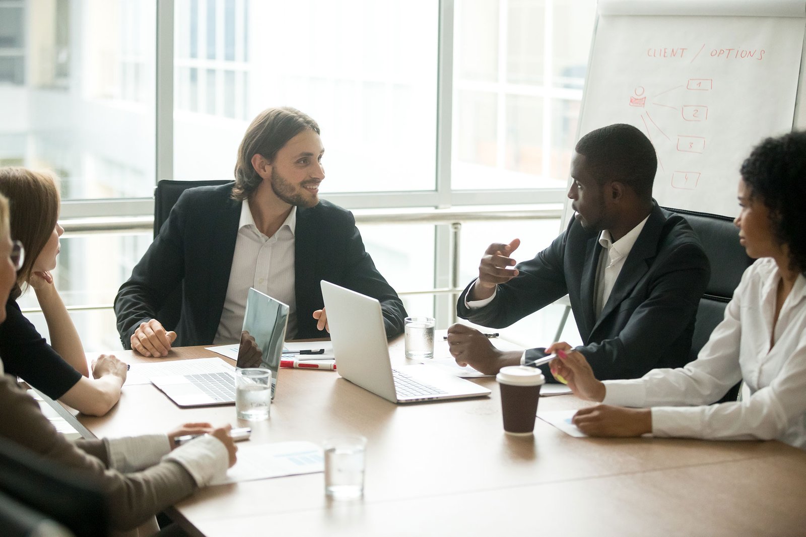 business-executives-discussing-project-ideas-at-te-LA7952R-1-1-1.jpg